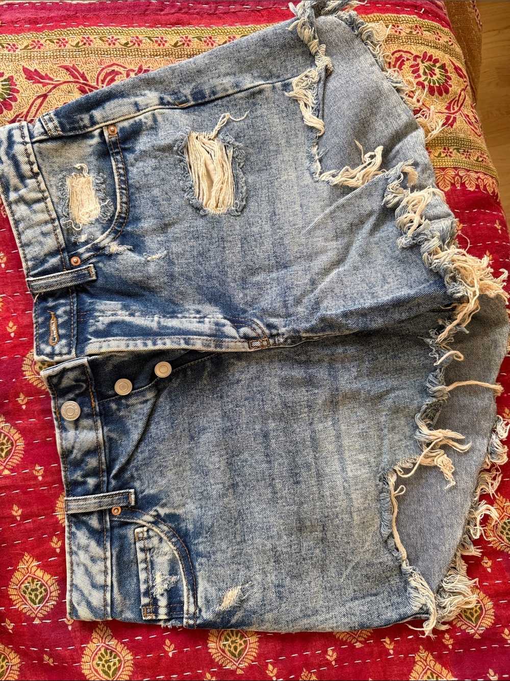 Distressed Light Blue Denim Cutoff Shorts